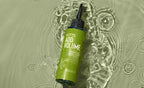 KMS Addvolume Liquid Strength Flasche liegend in Wasser auf grünem Grund