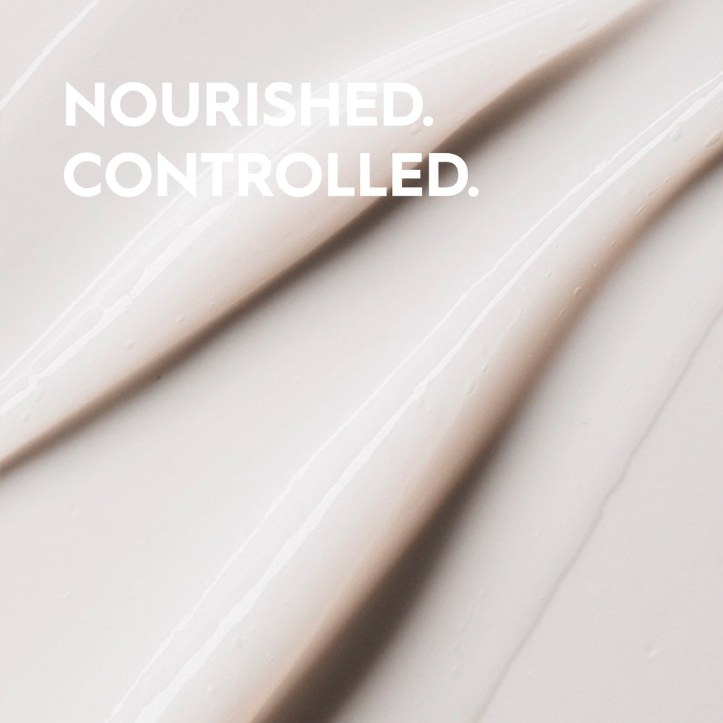 Kerasilk Bändigender Conditioner, cremige Textur in Nahaufnahme
